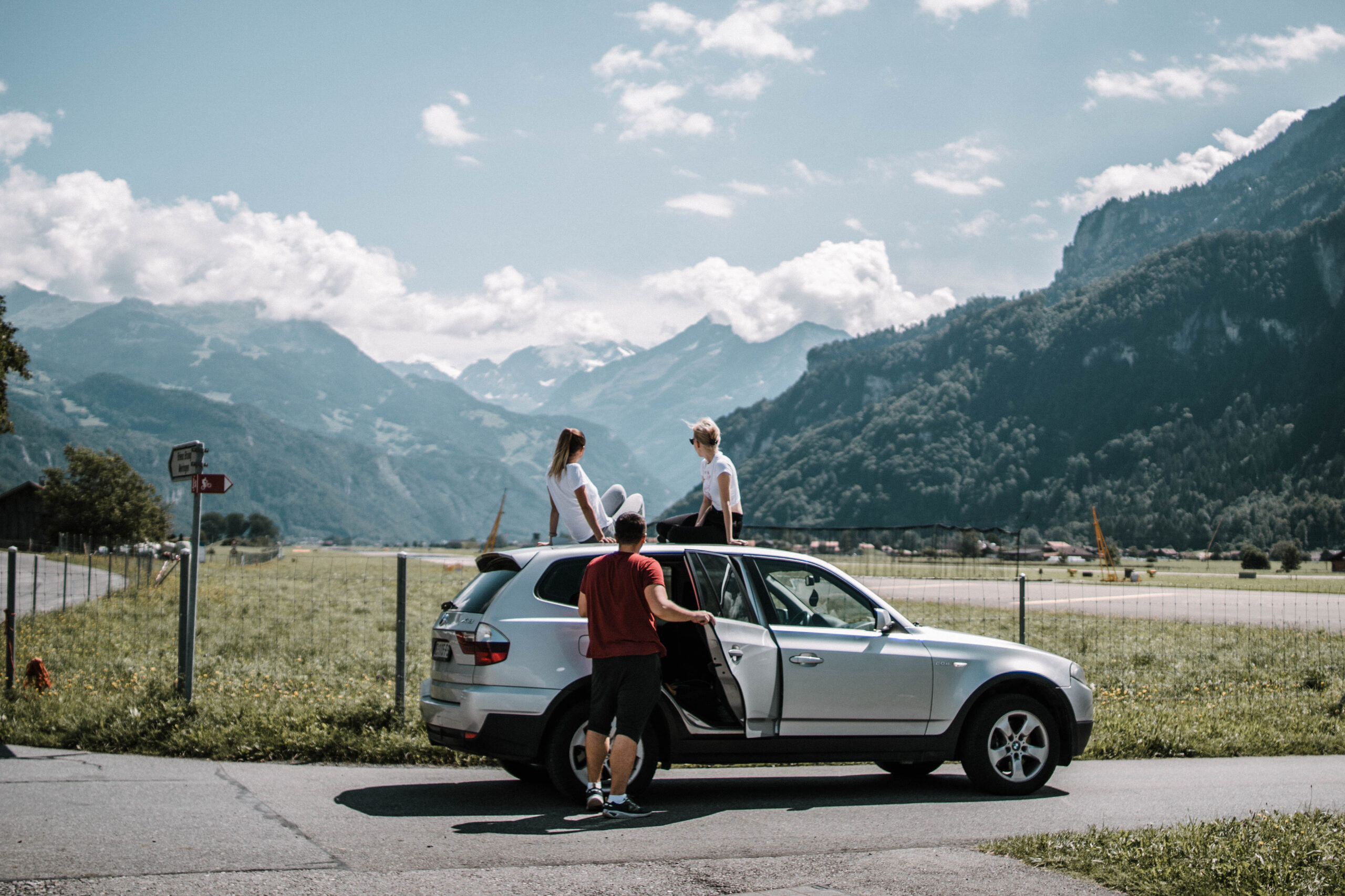 Family SUV in front of mountains